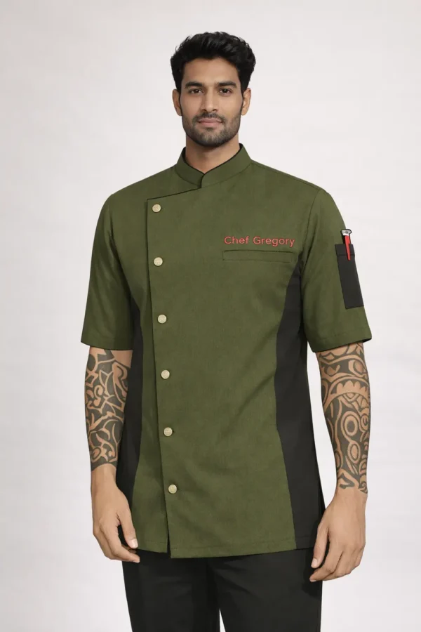 Olive green chef coat with black side panels, asymmetrical front, and short sleeves