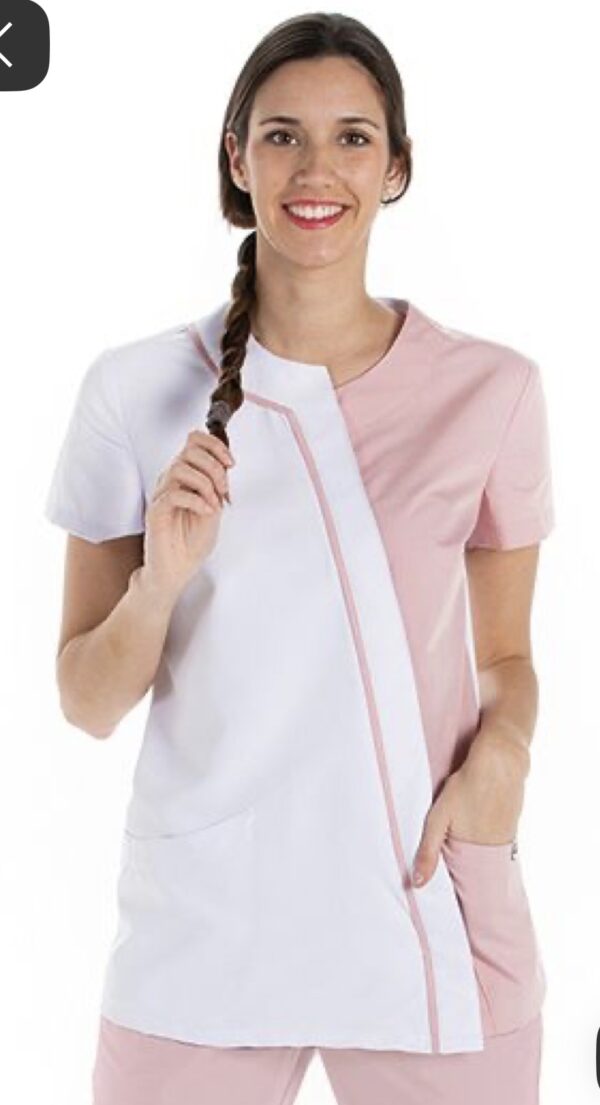 White and pink spa uniform with asymmetrical panel design, contrast piping, and short sleeves