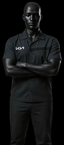 Premium black automobile technician uniform shirt with grey panel detailing and embroidered brand logo