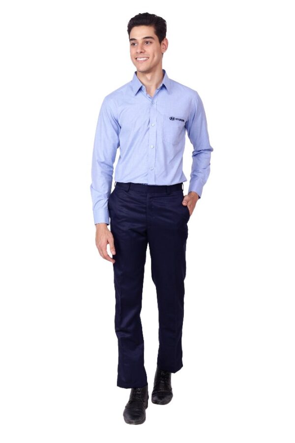Light blue corporate automobile uniform shirt with navy formal trousers